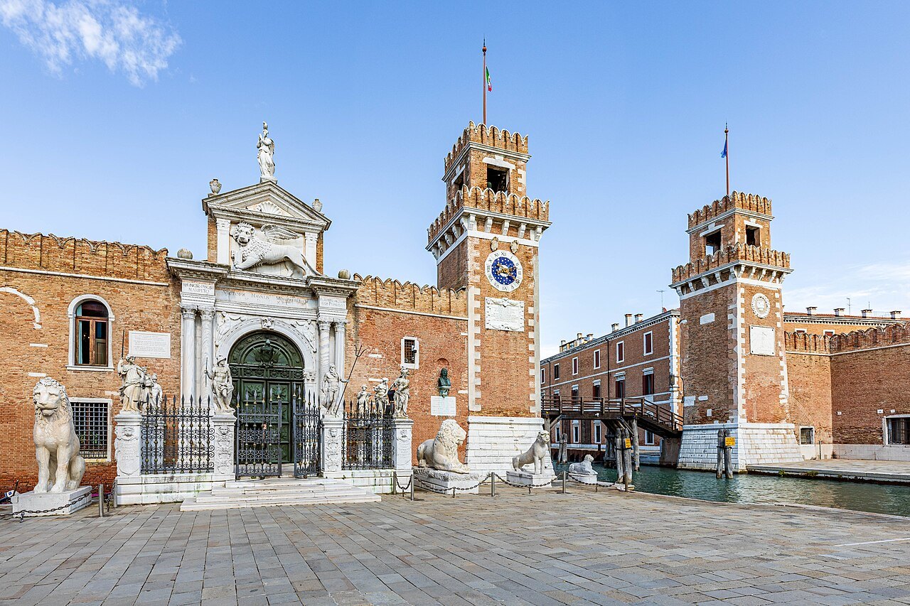 The Porta Magna of the Arsenale with its stone lions, beside the towers