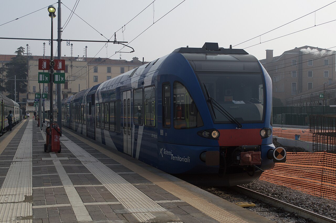 A blue regional train at Santa Lucia station