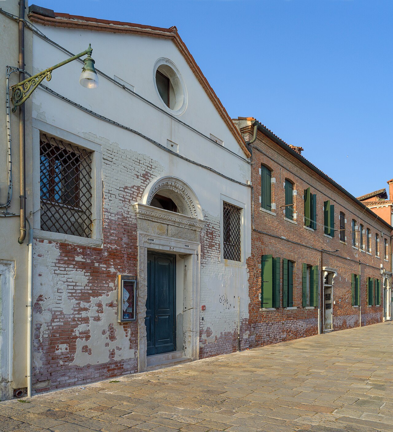 A plain brick front on a Cannaregio fondamenta