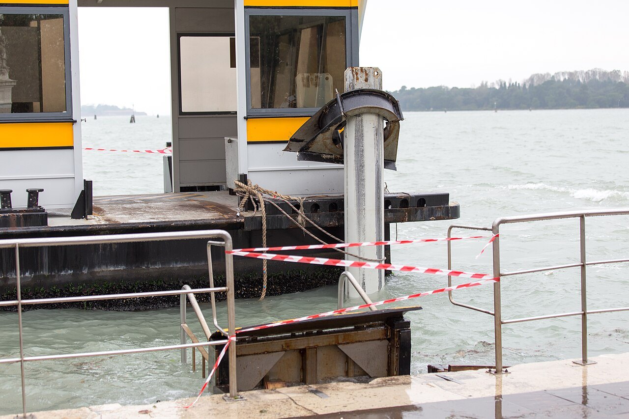 A water-bus landing closed off during high water