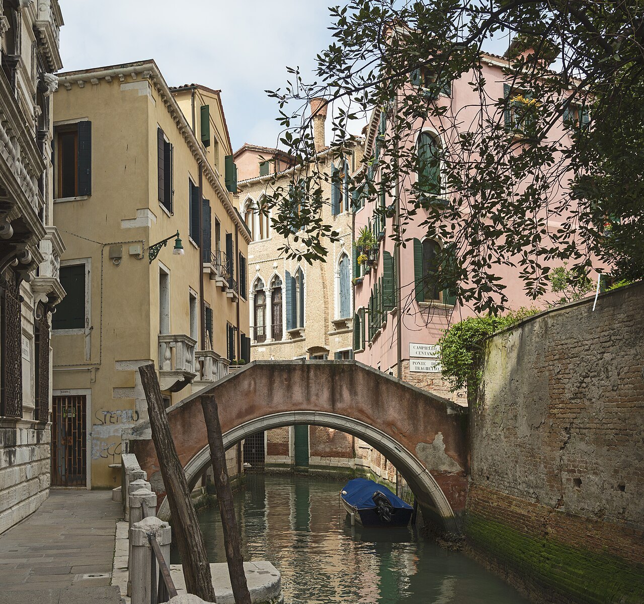 The Ponte del Traghetto over a quiet canal