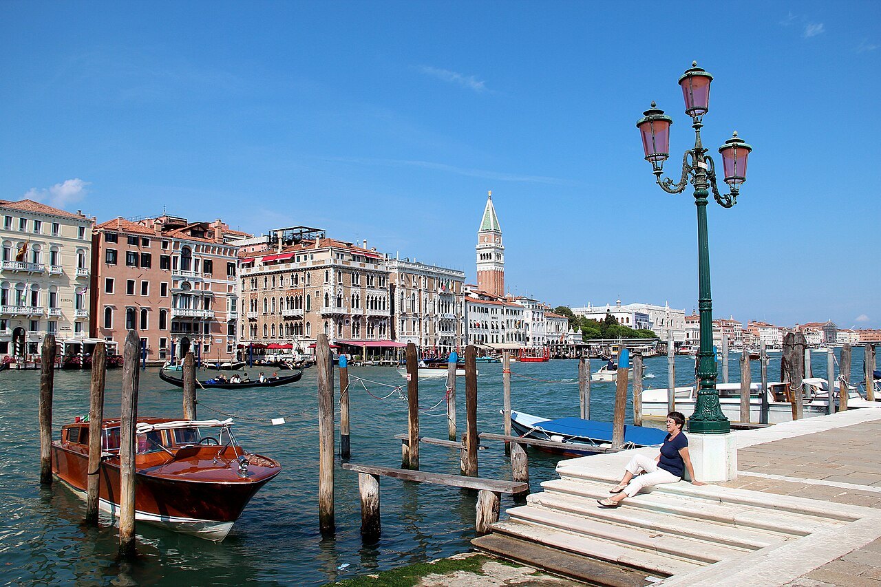 What will you see on a boat ride down the Grand Canal?