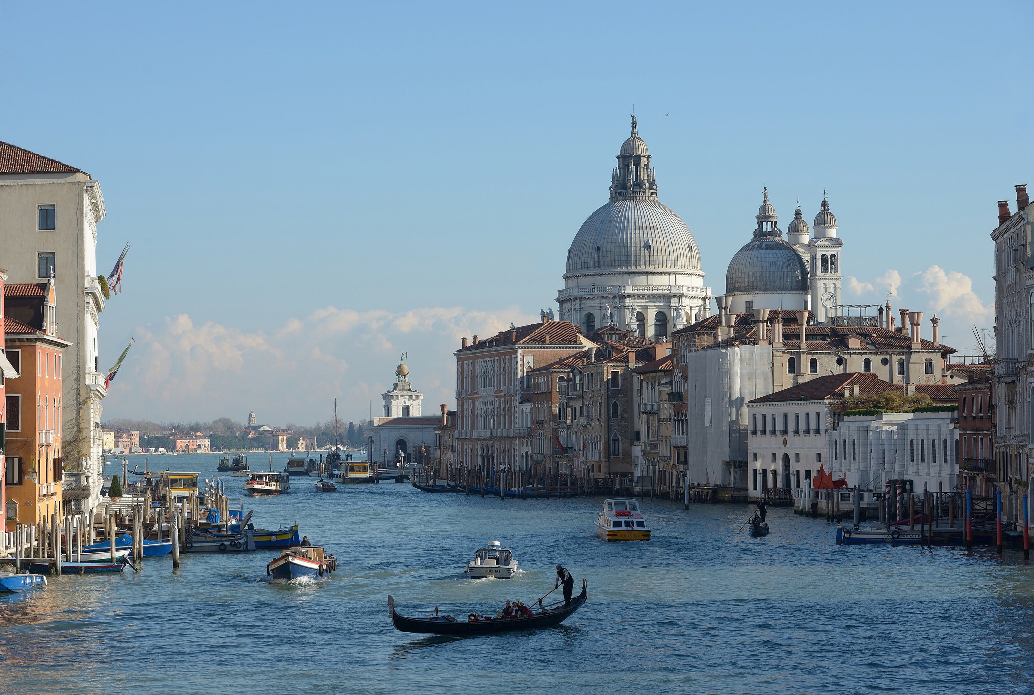 The Grand Canal looking towards Santa Maria della Salute, palazzi lining both banks and gondolas on the water