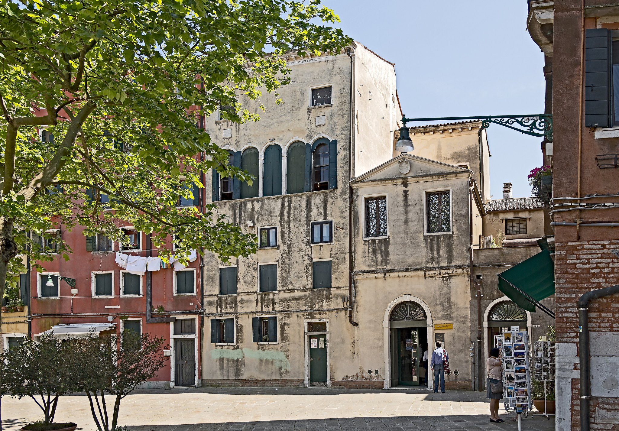 The façades of two synagogues on the Campo del Ghetto Nuovo, plain from the outside as they were required to be