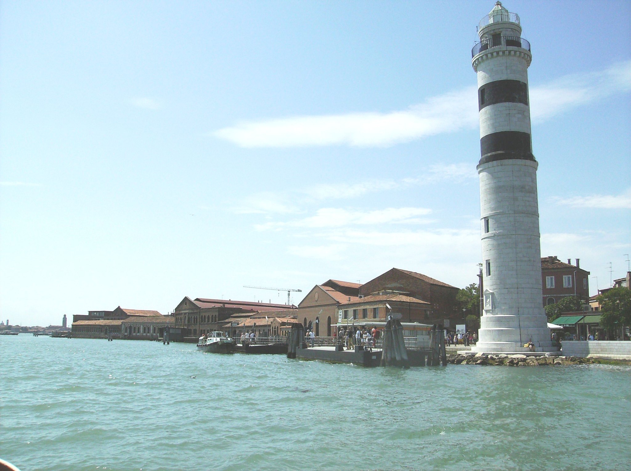 The lighthouse on Murano, a white tower at the edge of the lagoon