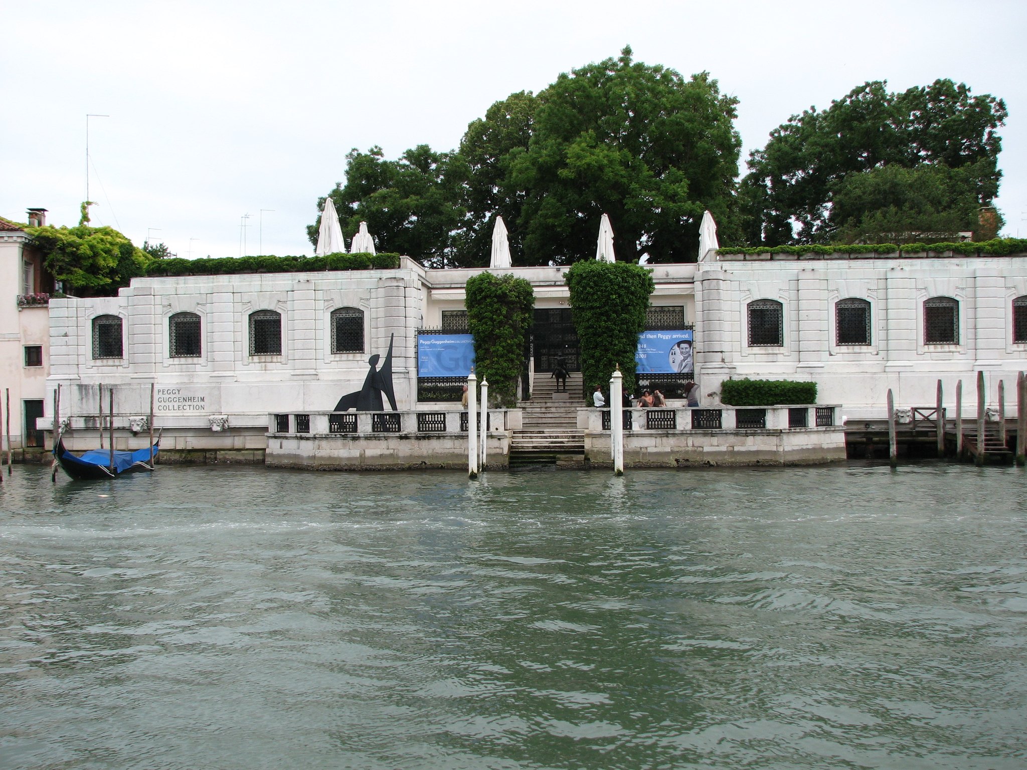 The Peggy Guggenheim Collection from across the Grand Canal, low and white between taller palazzi