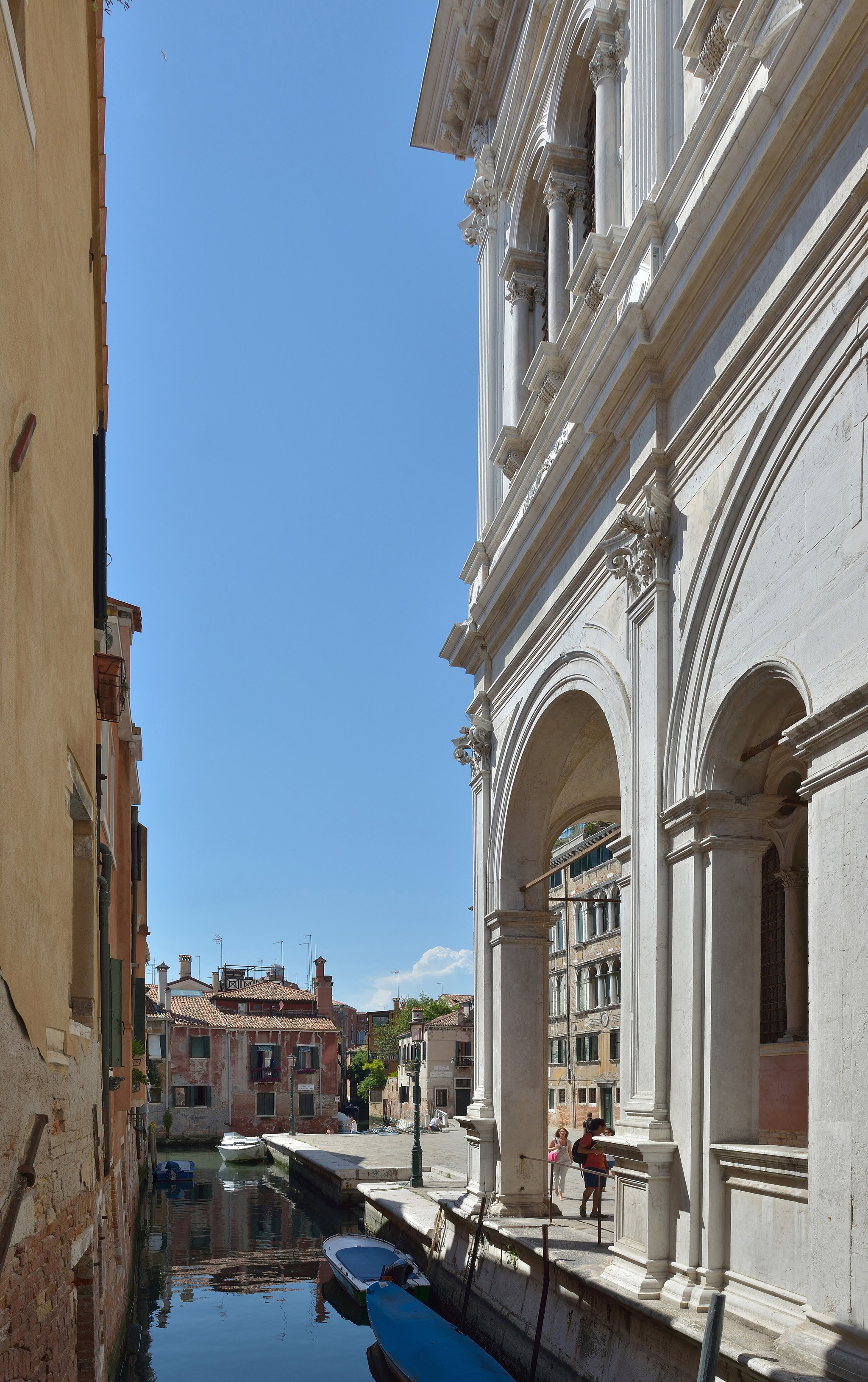 The front of the Scuola Grande di San Rocco, a white marble façade of columns and round windows