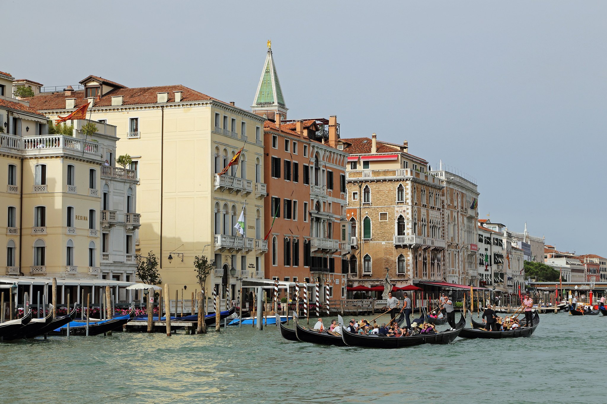 A stretch of the Grand Canal lined with palazzi, boats moving between them
